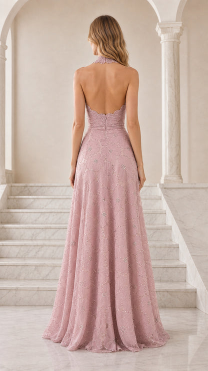 Back view of woman wearing open-back dusty pink halter formal gown