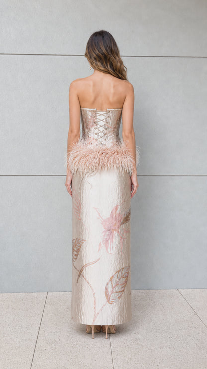 Back view of champagne jacquard maxi dress highlighting lace-up corset detail