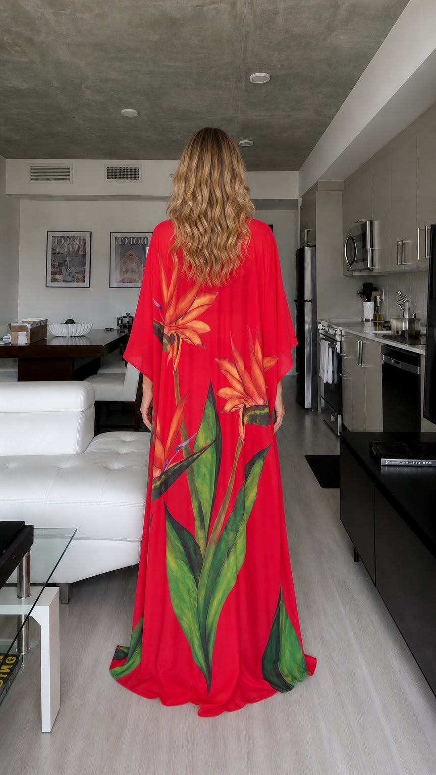 Back view of model wearing floor-length red floral kimono cardigan