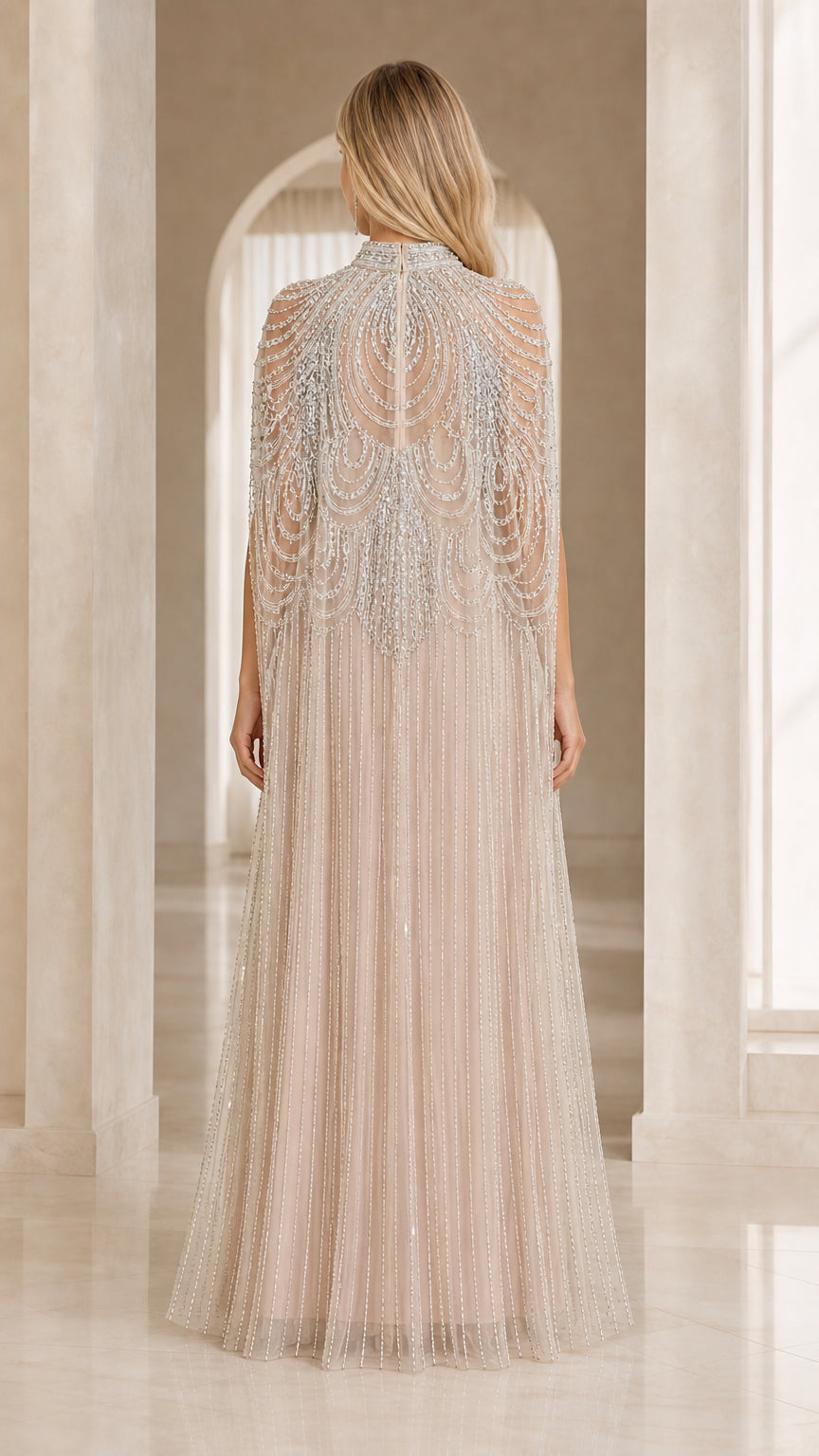 Champagne beaded cape evening gown back view showing cape drape
