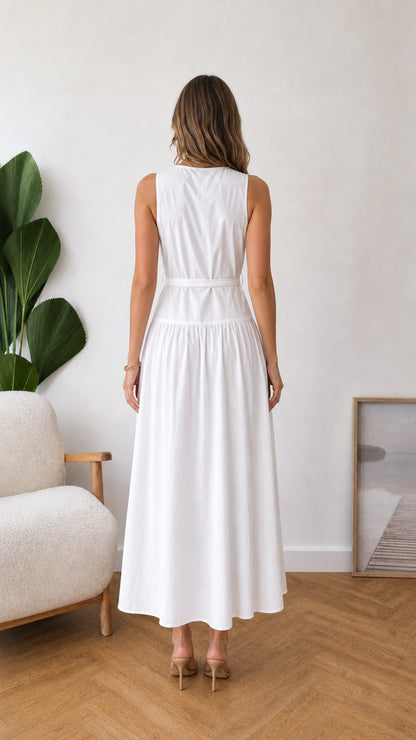 Back view of model wearing white sleeveless midi dress