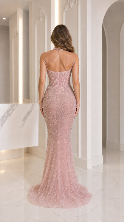 Back view of pink beaded evening gown