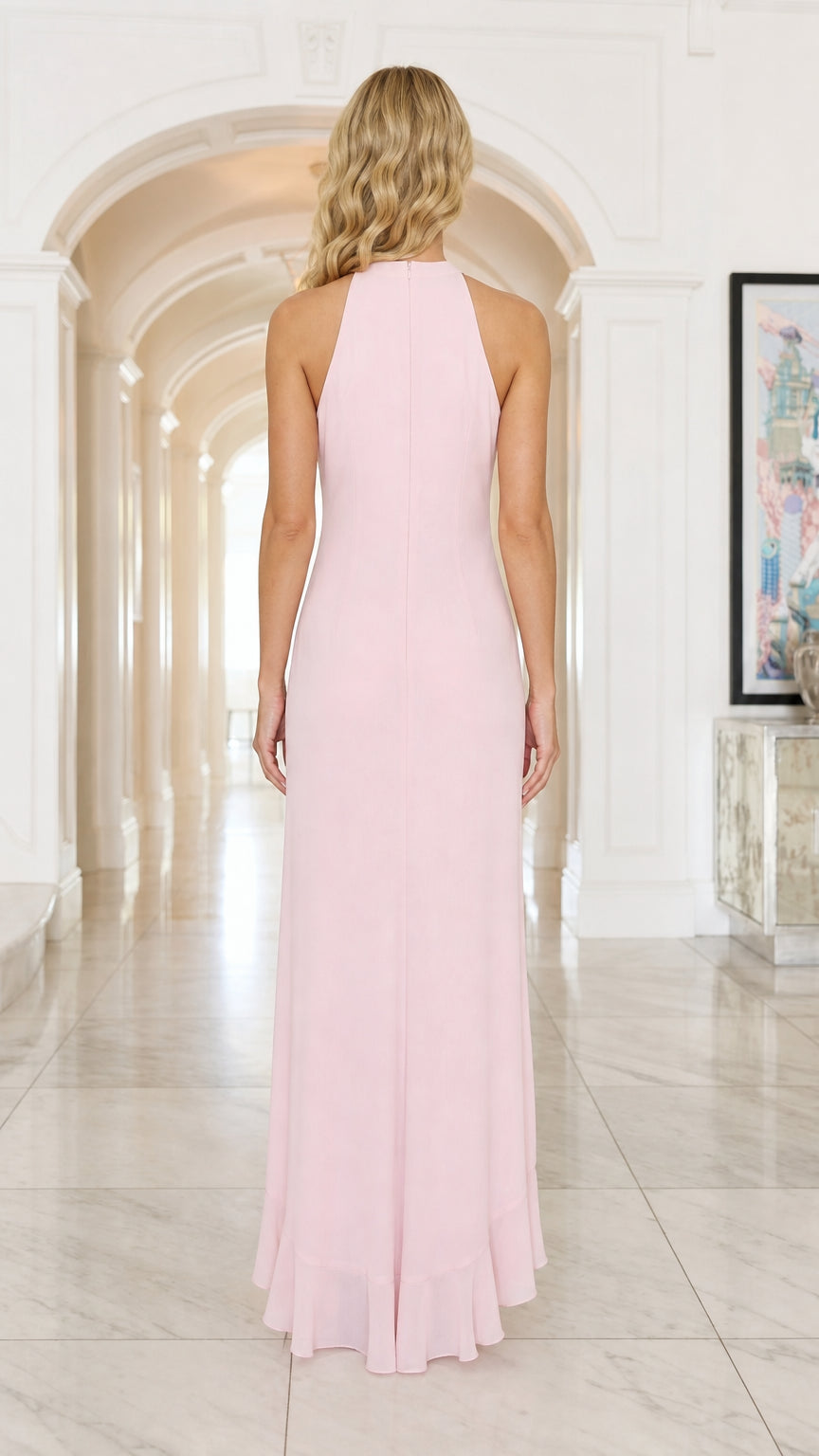 Back view of model in pink halter maxi dress