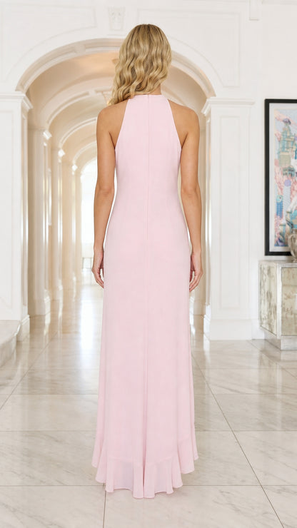 Back view of model in pink halter maxi dress