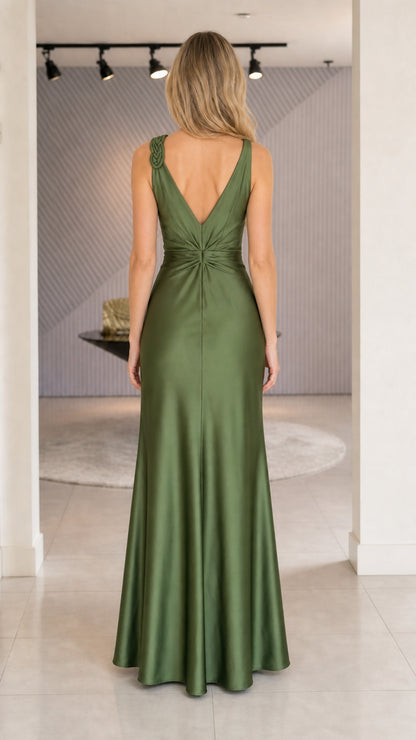 Model wearing olive green satin evening dress back view
