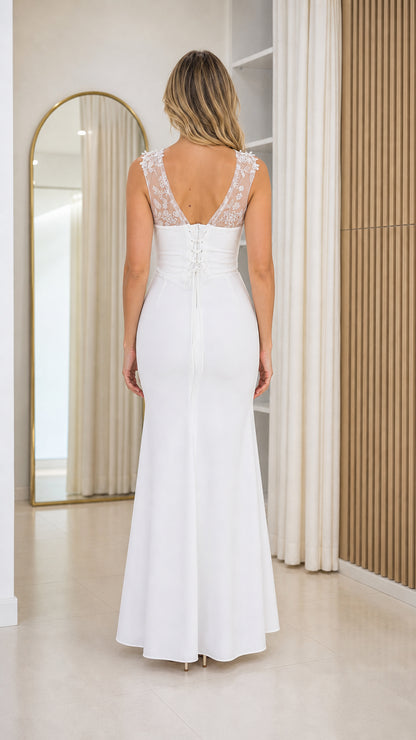 Back view of white evening dress with lace-up corset detail