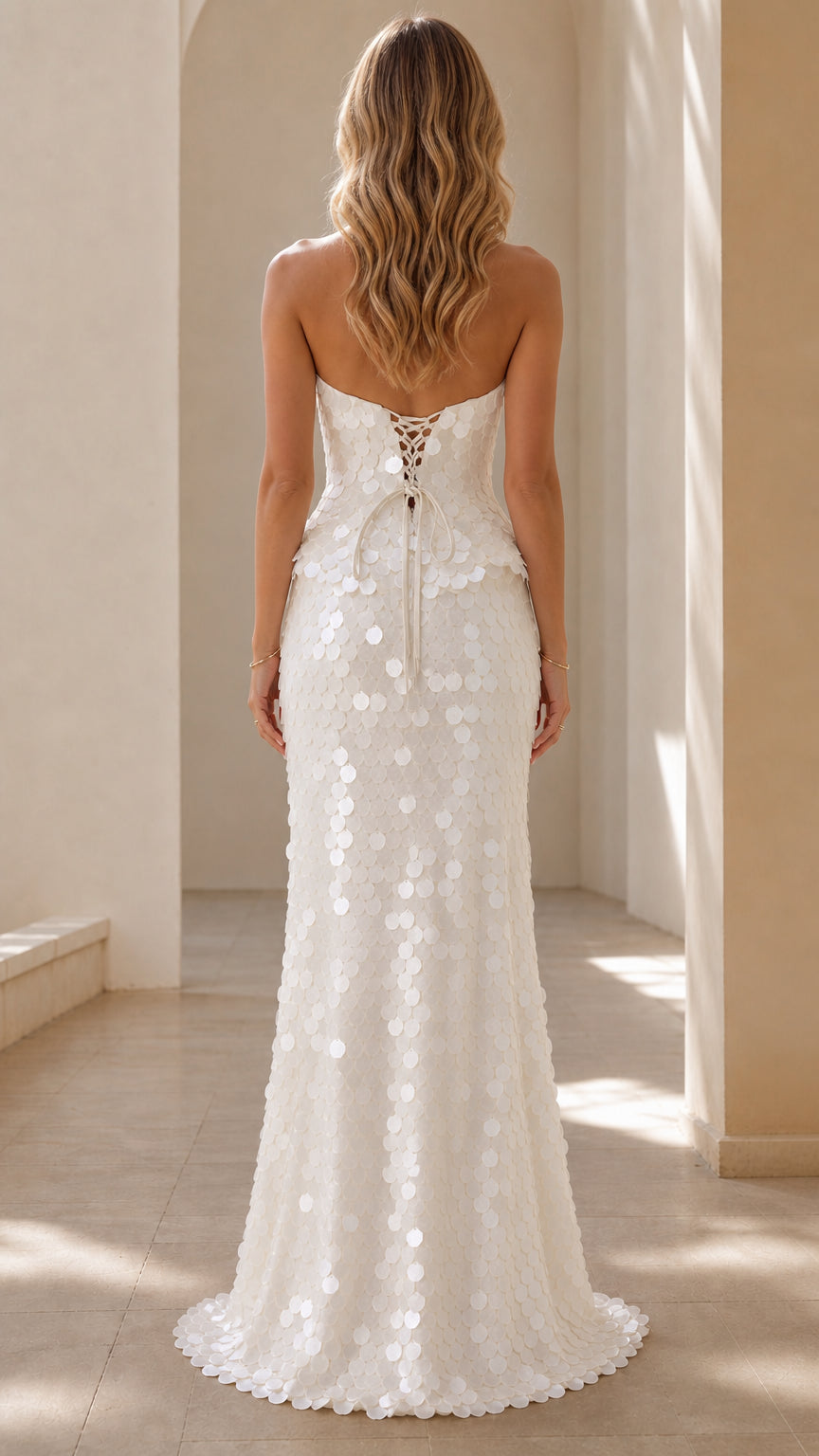 Back view showing lace-up detail of White sequin dress