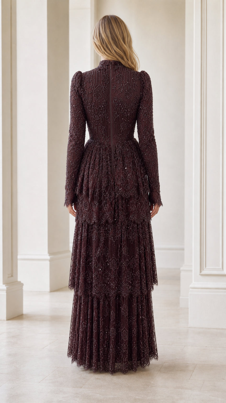 Back view of model in high neck long sleeve burgundy embellished maxi dress