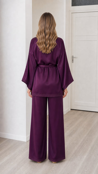 Back view of deep purple silky satin wide leg pant and top co ord set
