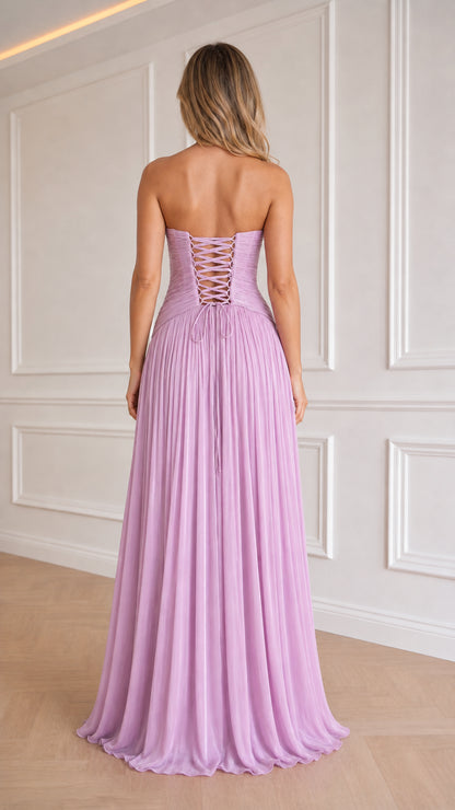 Back view of model showing lace-up corset detail on lavender gown