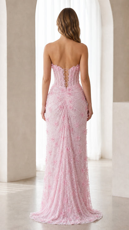 Back view of pink strapless maxi dress with lace-up detail