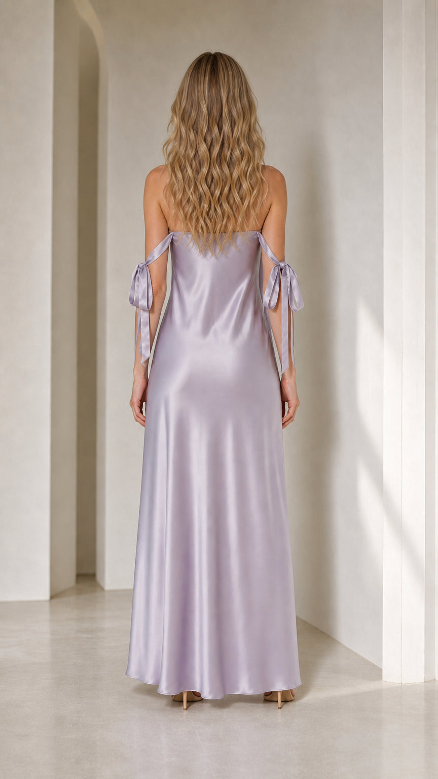 Model in lavender satin maxi dress from back view