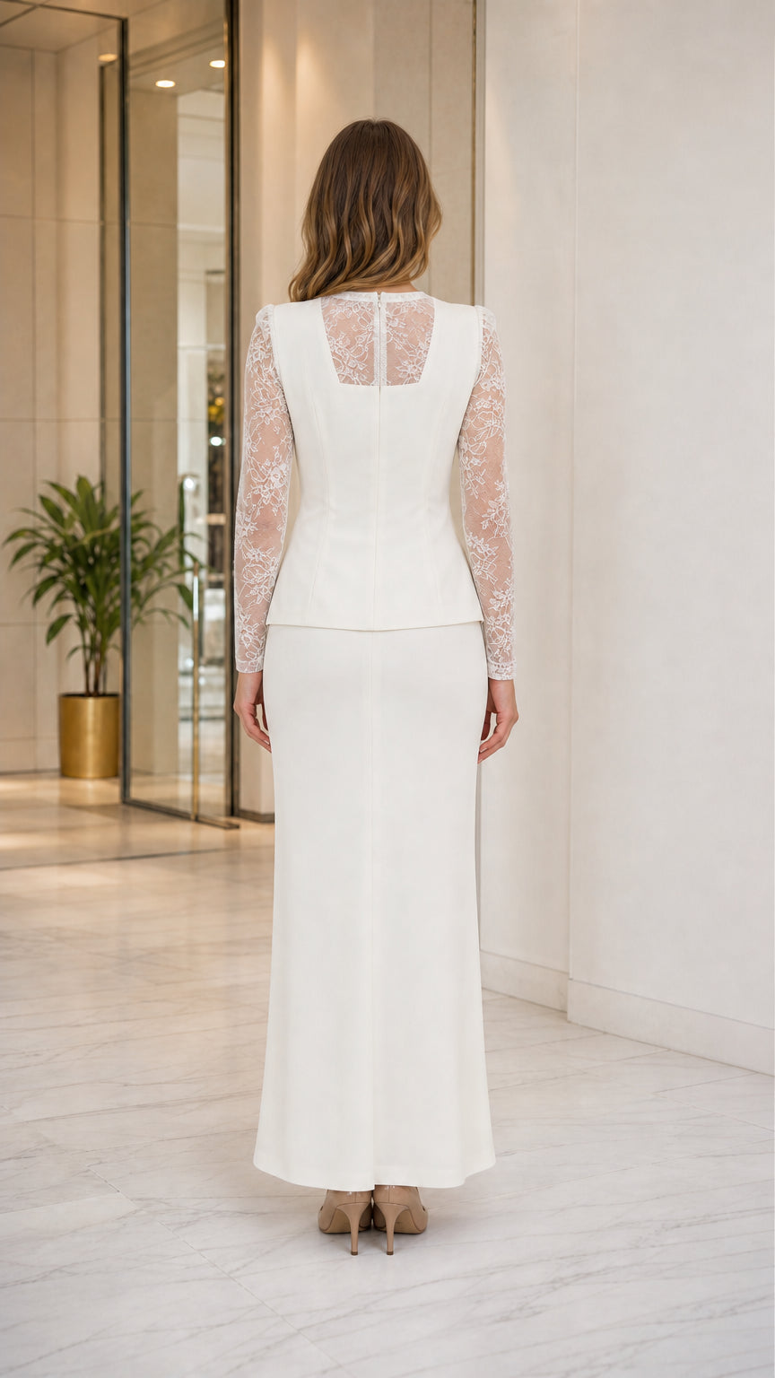 Back view of Ivory evening maxi dress highlighting sheer lace back yoke and long lace sleeves