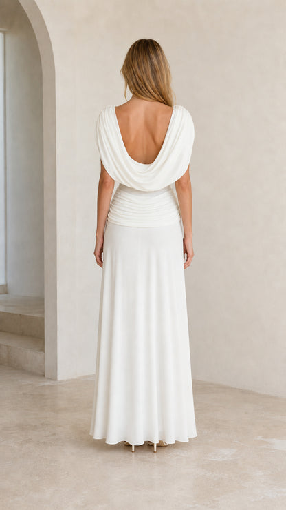 Back view of White dress showing low scoop back and flowing skirt