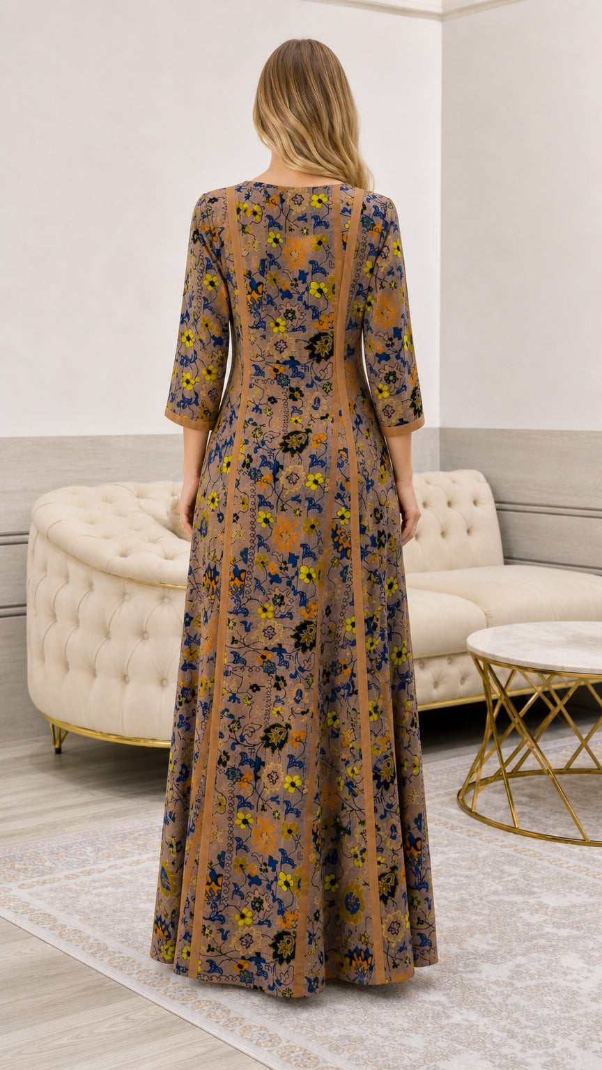 Back view of model wearing taupe floral A-line maxi dress