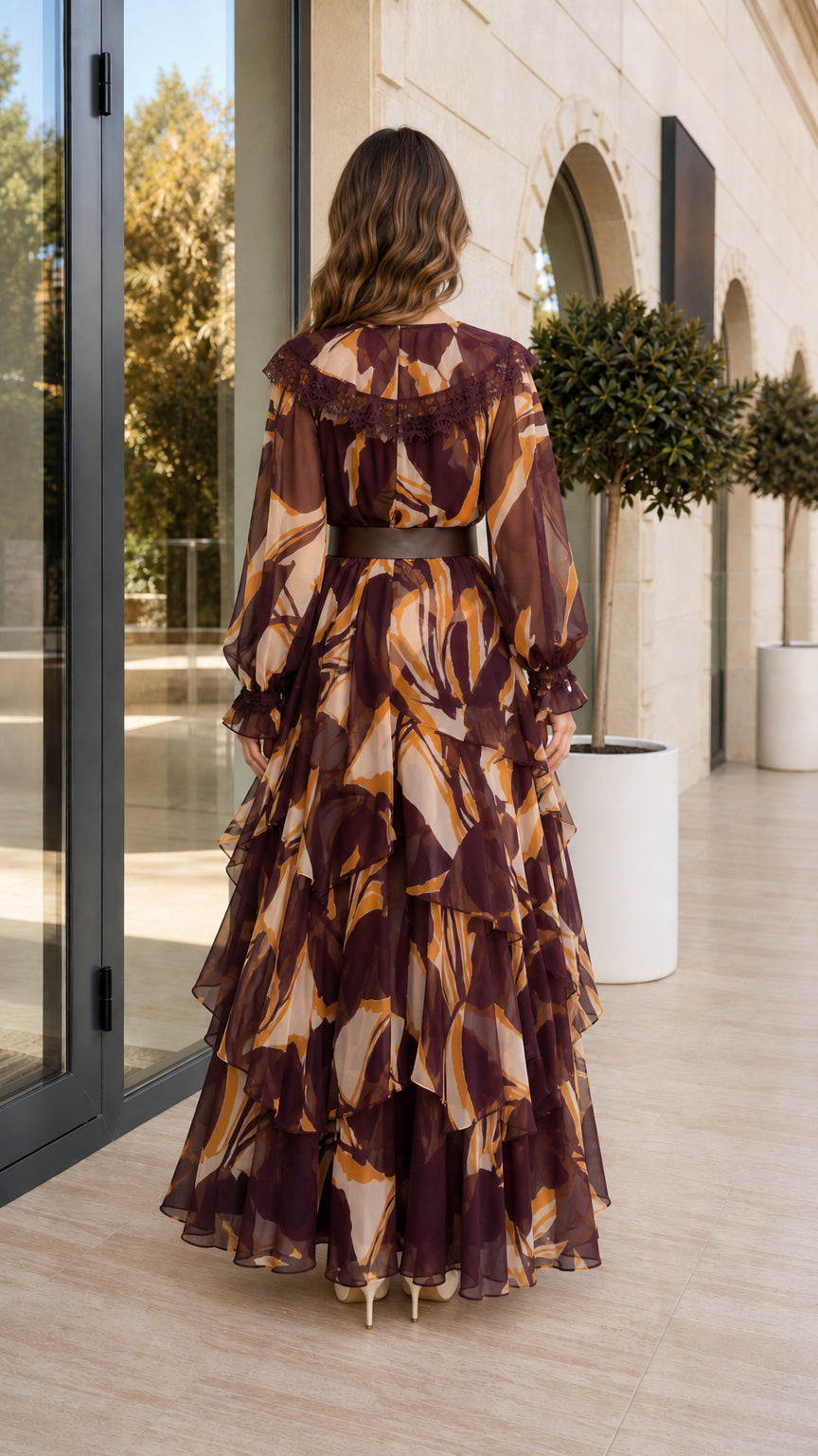 Back view of burgundy tiered ruffle maxi dress with long sleeves