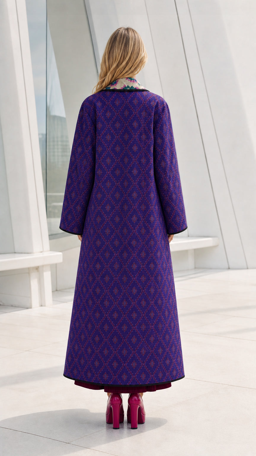 Back view of model in purple long coat