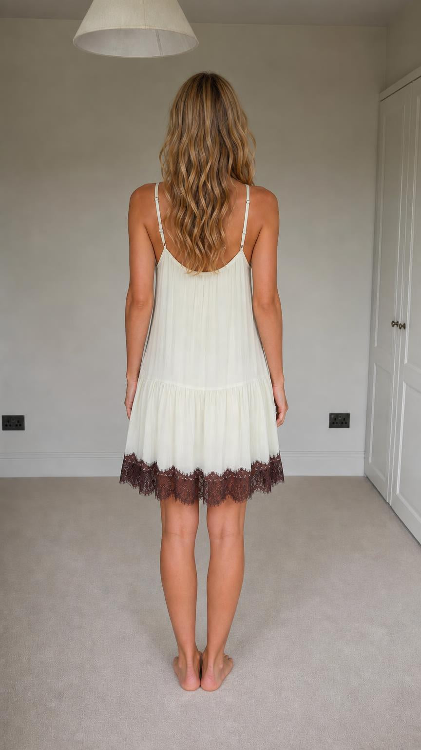Back view of white lace trim mini dress