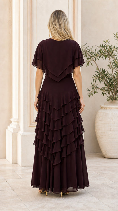 Back view of model wearing burgundy tiered maxi dress
