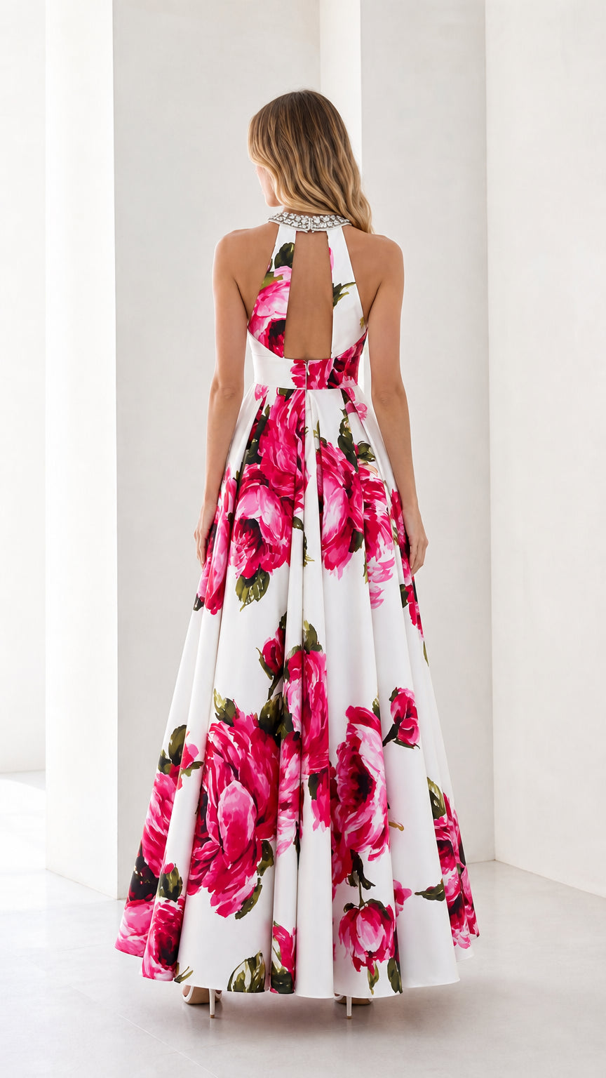 Back view showcasing open-back detail of the floral gown