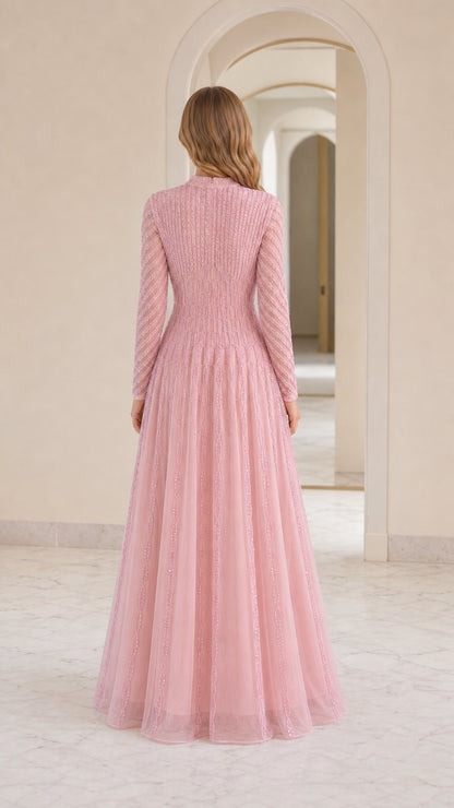 Back view of model in pink sequin evening gown