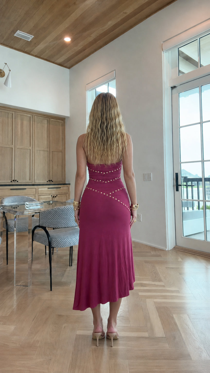Woman wearing burgundy embellished halter midi dress back view