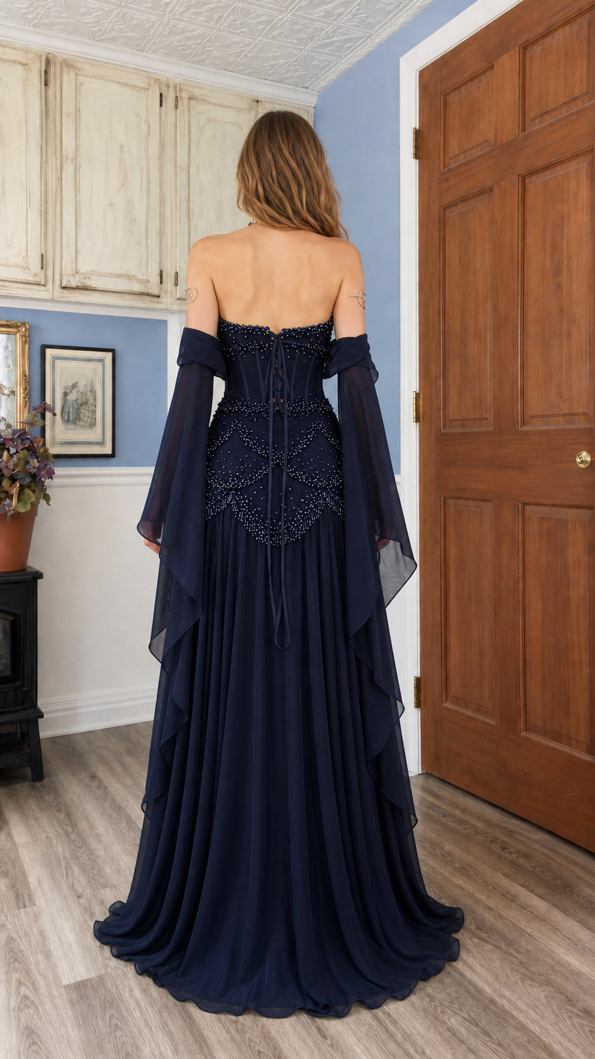 Navy blue evening gown featuring lace-up corset back detail and flowing skirt