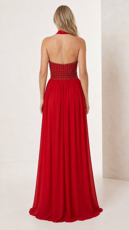 Back view of red halter open-back evening gown with beaded waist