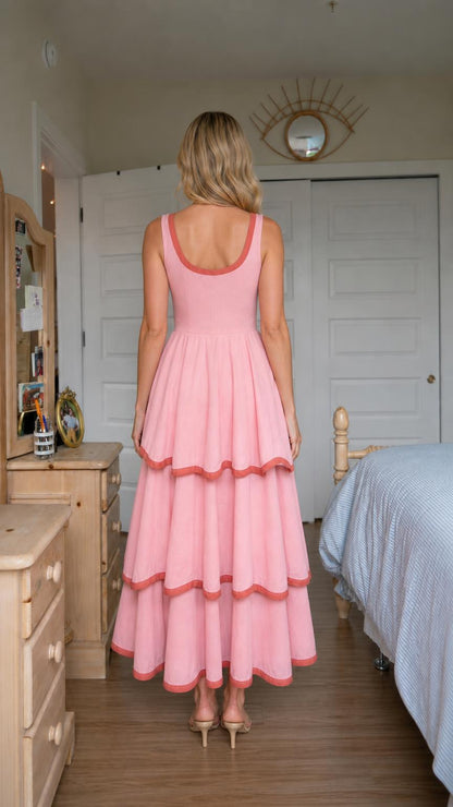 Back view of woman wearing pink tiered maxi dress