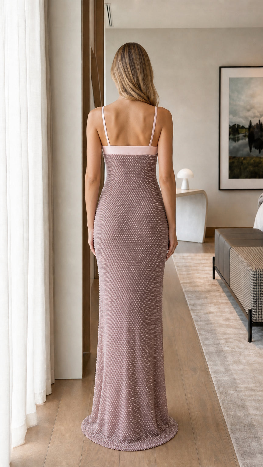 Back view of model in pink sequin maxi dress