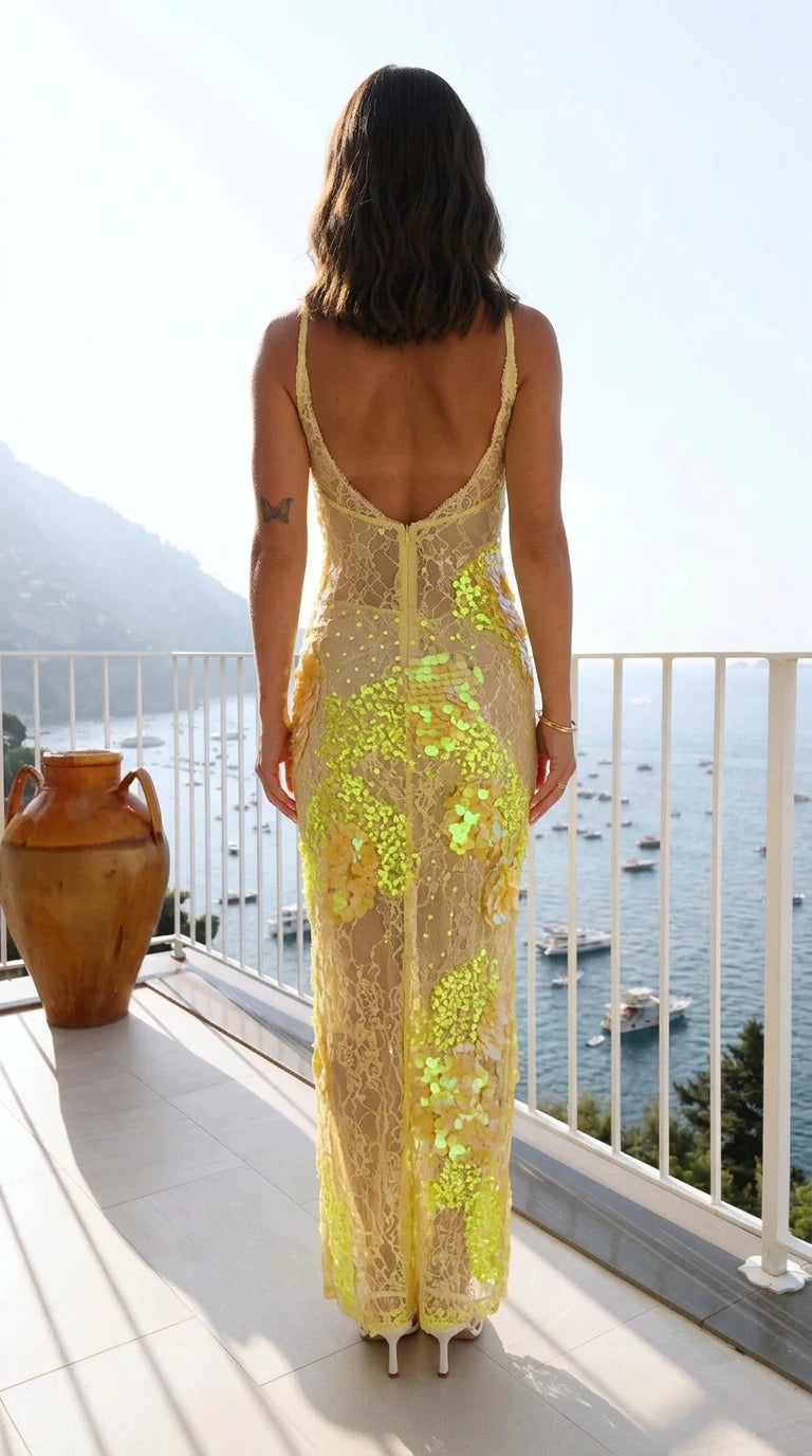 Back view of yellow sequin lace maxi dress with low back