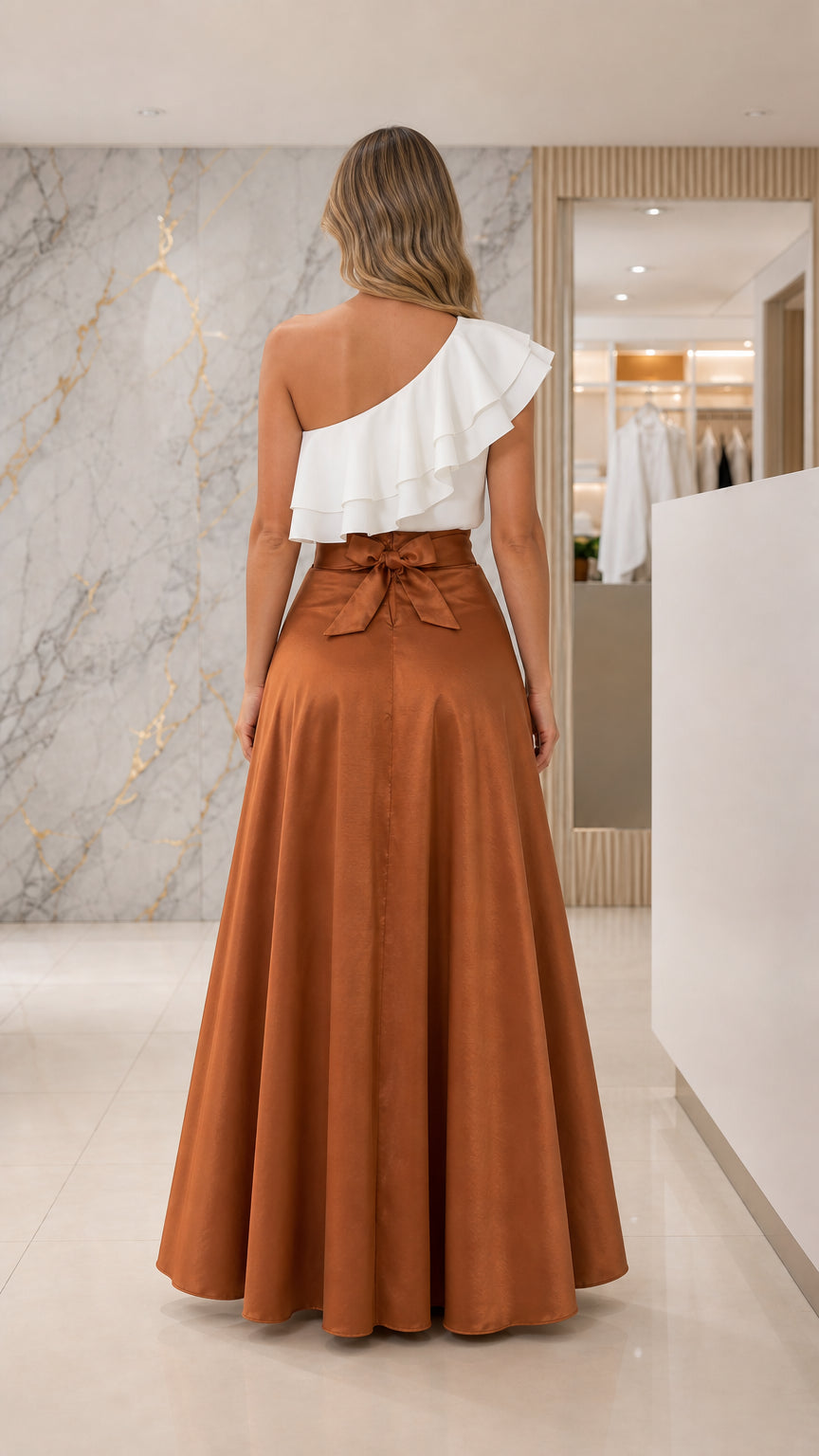 Back view showing bow detail on caramel brown maxi dress