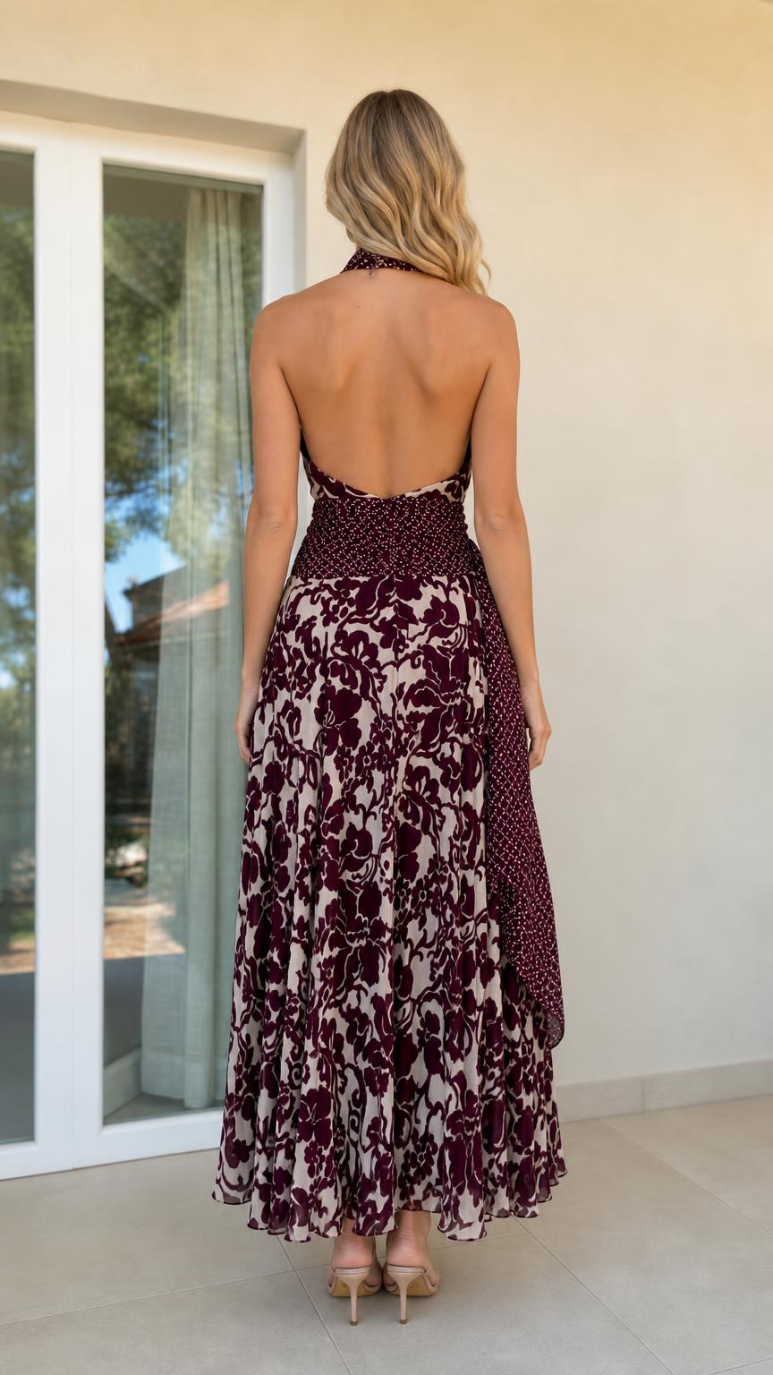 Back view showcasing open back design of burgundy maxi dress