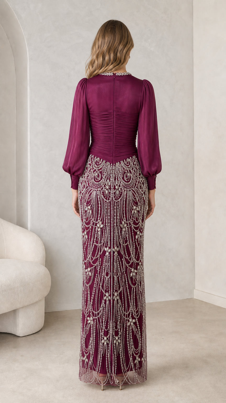 Back view of burgundy maxi gown with detailed beading