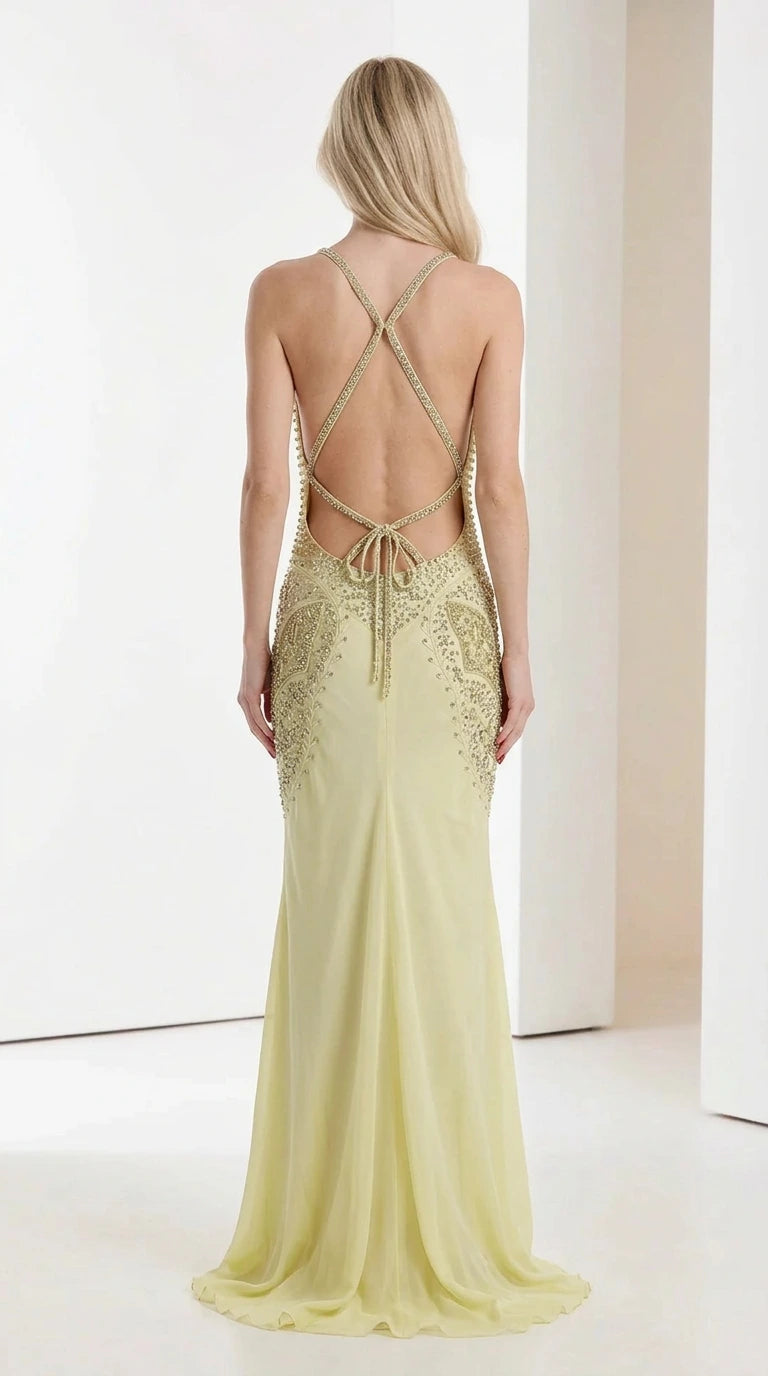 Back view showing lace-up straps on yellow maxi dress