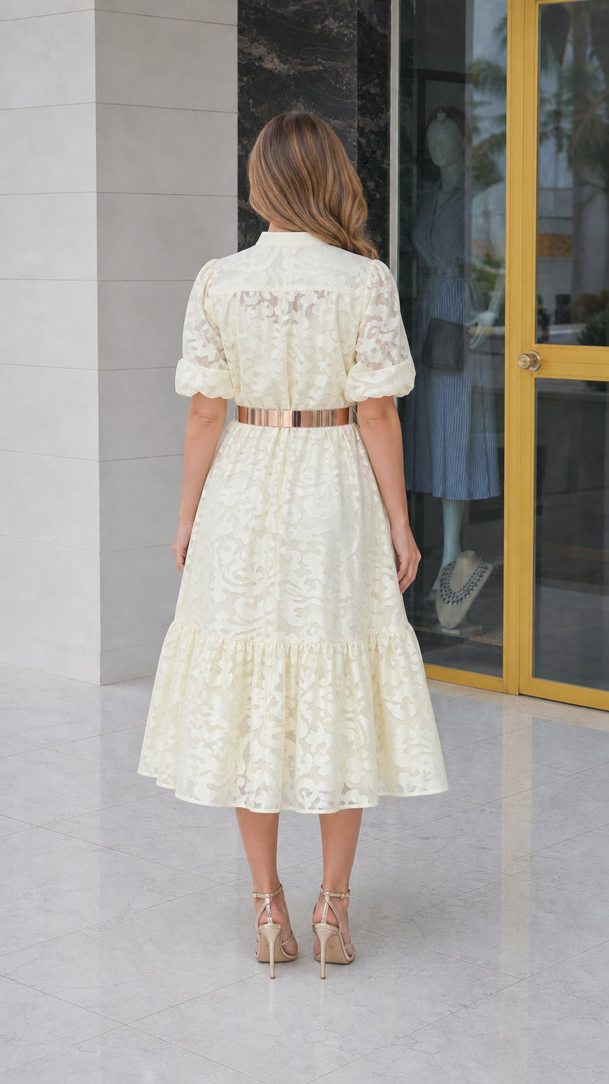 Back view of model in off-white lace midi dress