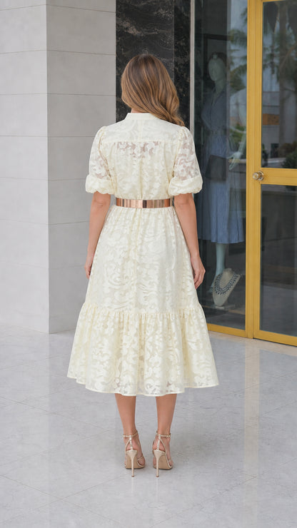Back view of model in off-white lace midi dress