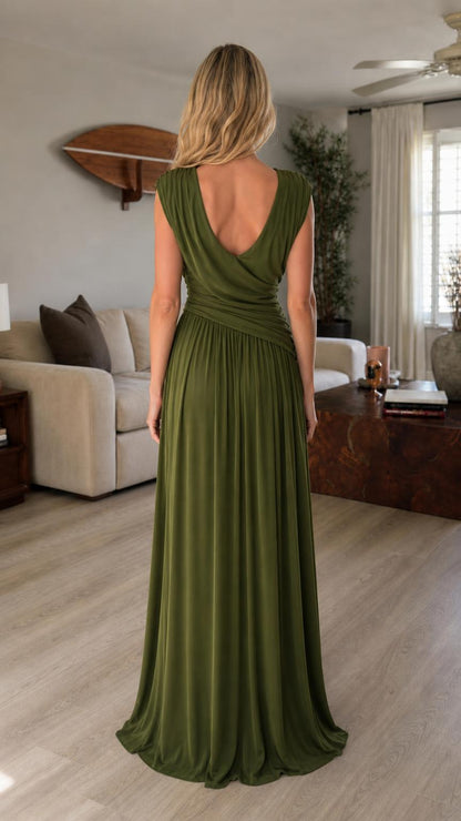 Back view of model showcasing back neckline of olive green maxi dress