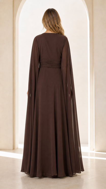 Back view of model wearing Chocolate Brown cape sleeve maxi gown