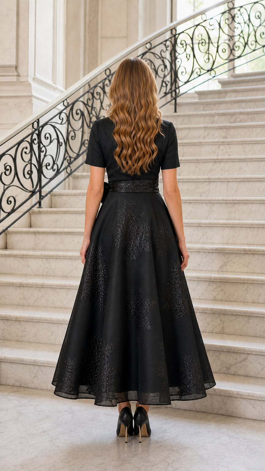 Back view of black midi dress