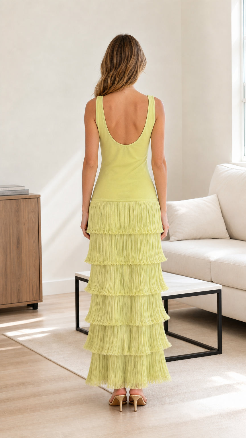 Back view of model wearing lime green scoop back tiered fringe maxi dress