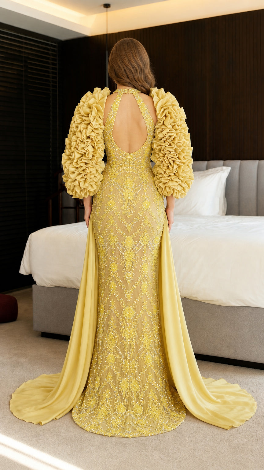 Back view showing keyhole cutout and train of yellow gown