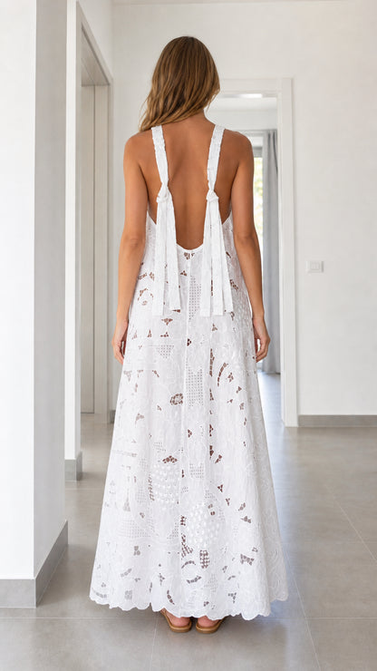 Back view of white eyelet lace maxi dress showing tie straps