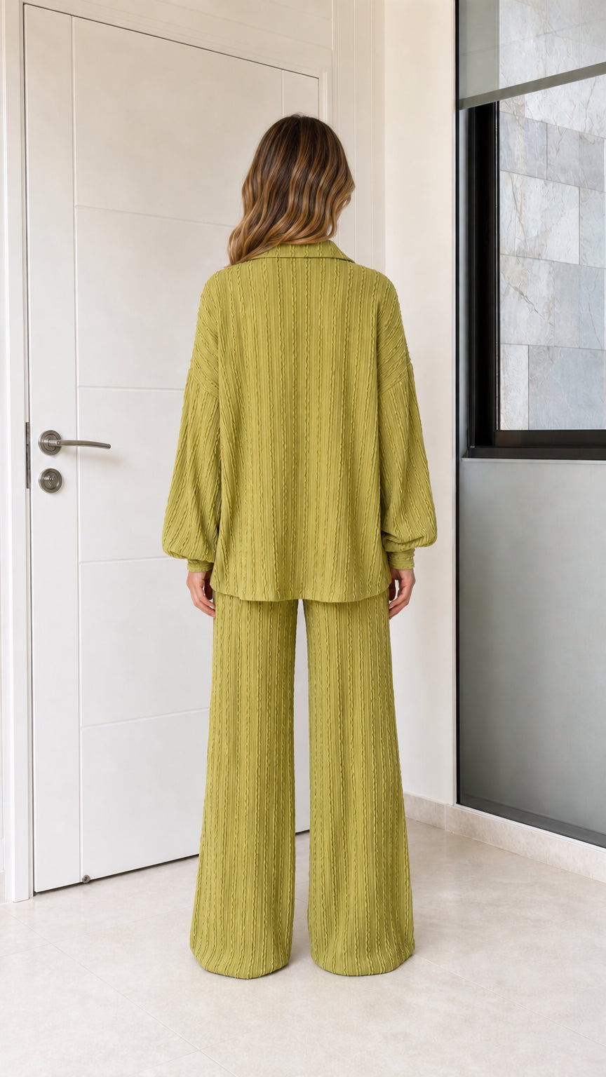 Back view of woman wearing olive green textured two-piece pant set