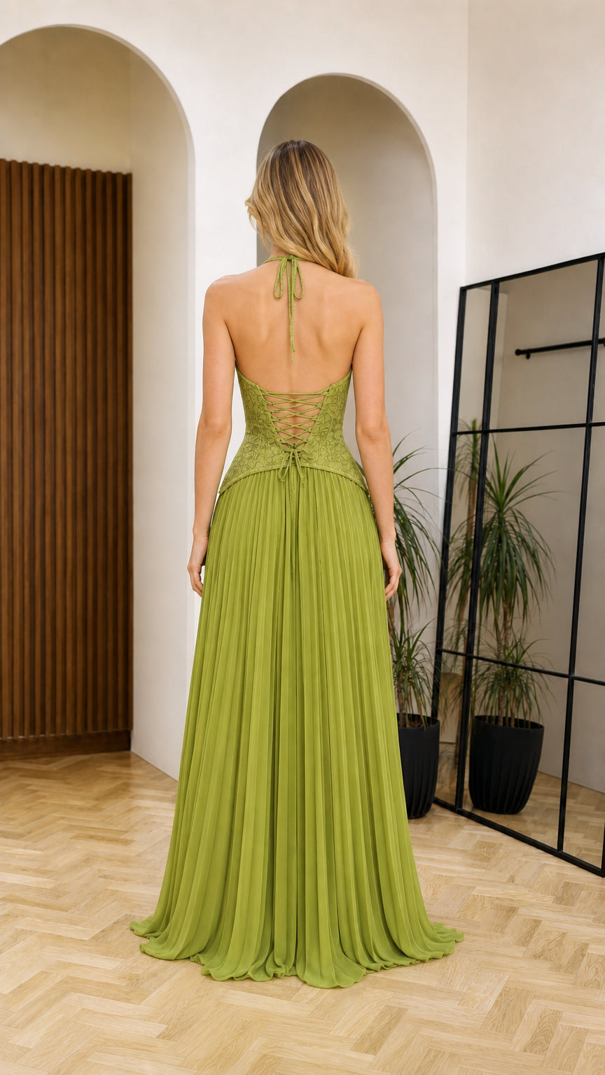 Back view showing lace-up back detail on olive green maxi dress
