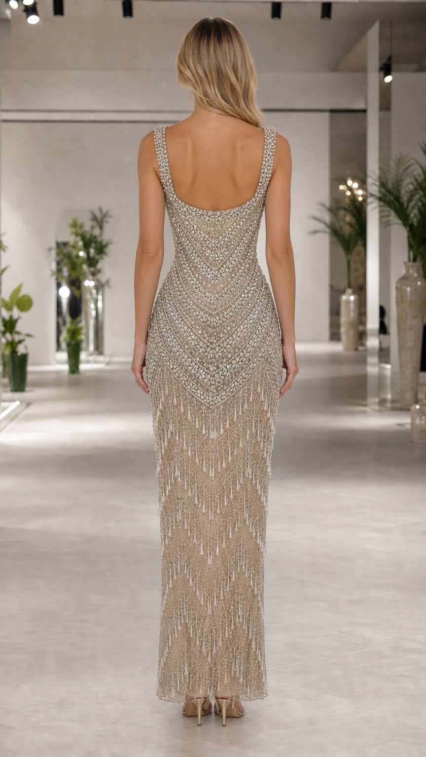 Back view of champagne beaded maxi gown with low scoop neckline