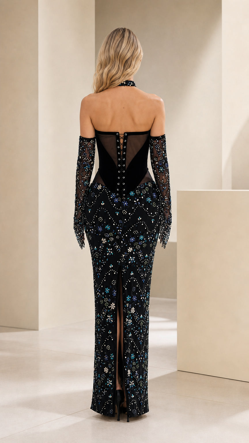 Back view showcasing lace-up corset detail on black evening dress