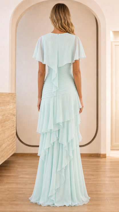 Back view of light blue formal dress with cape overlay