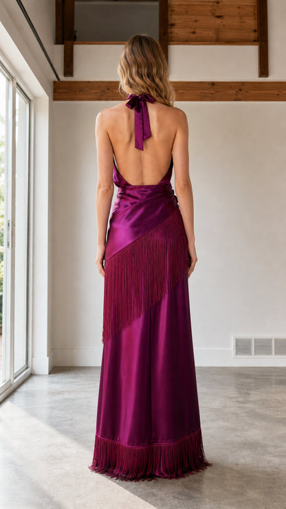 Back view of magenta satin dress highlighting open halter back