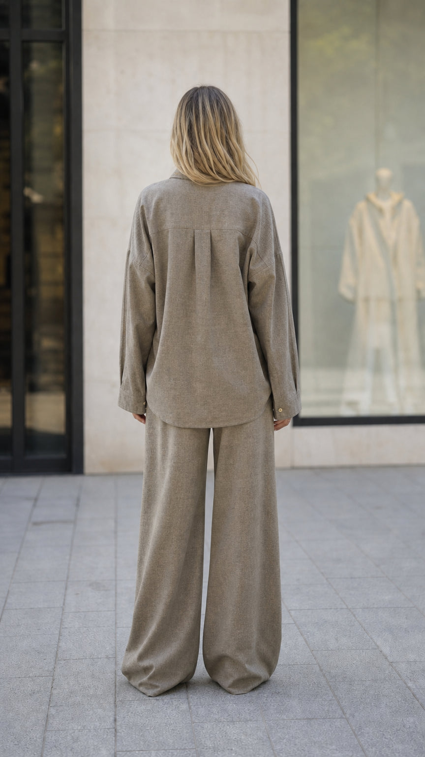 Back view of woman wearing taupe matching set